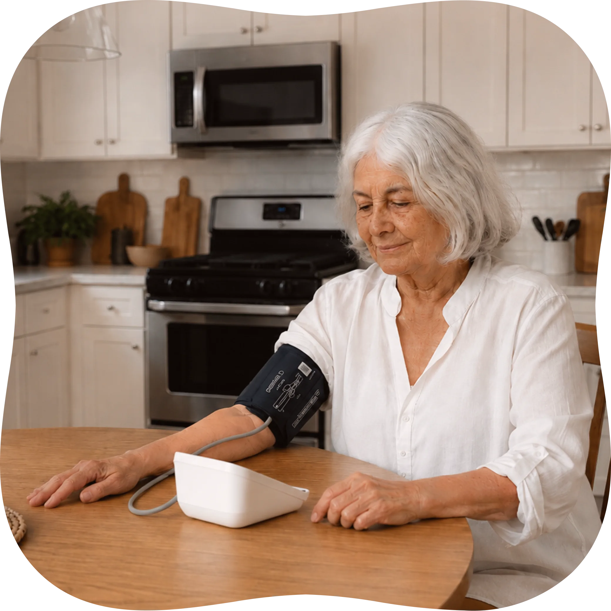A patient checking her blood pressure at home